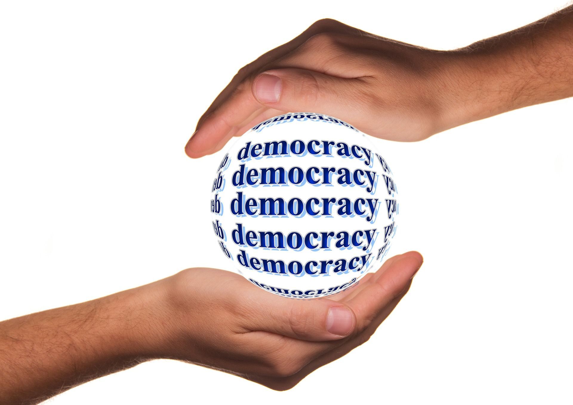 Behütende Hände, dazwischen die Demokratie